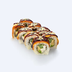Japanese cuisine. Sushi roll with smoked eel on white background.