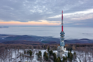 Fototapeta premium Hungary - Kekesteto in winter time with TV tower, this is the highest point in Hungary