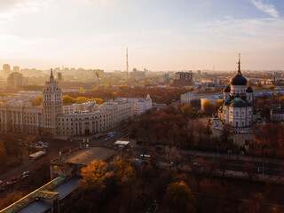 Evening autumn Voronezh cityscape. Annunciation Cathedral and Tower of Management of South-east railway at sunset, aerial view