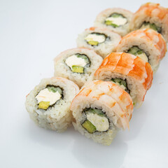 Japanese cuisine. Sushi roll on white background.