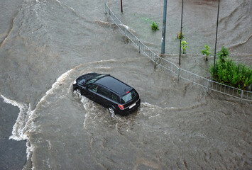 Heavy rains caused flooding on the city's roads.