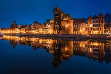 Fototapeta na wymiar The old town of Gdańsk during the blue hour. A warm summer evening in the old Hanseatic city.