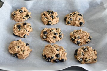 Cookies made of oat and blueberries are ready to cook