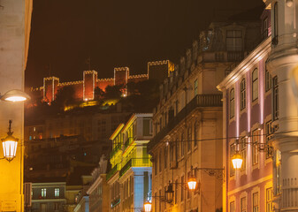 Fototapeta na wymiar Night view on Sao Jorge castle and Christmas lights of the city.Lisbon - Portugal 