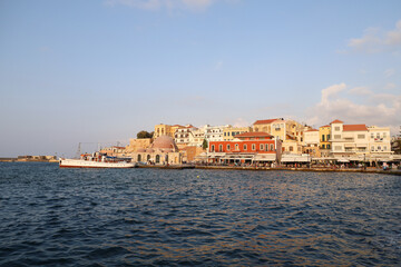 Fototapeta na wymiar Colorful pier of the port of Chania, in Crete, Greece
