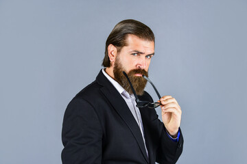 mens jacket wardrobe. fashionable man wear glasses. formal fashion model. handsome man standing on...