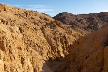 Coloured Canyon in Dahab on South Sinai (Egypt) peninsula. Desert rocks of multicolored sandstone background..