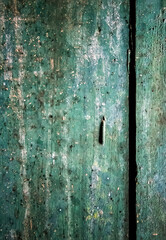 Textured Rustic Old Painted Peeling Cabinet in Green with One Nail