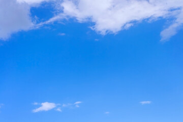Beautiful blue sky with clouds on bright  sunny day
