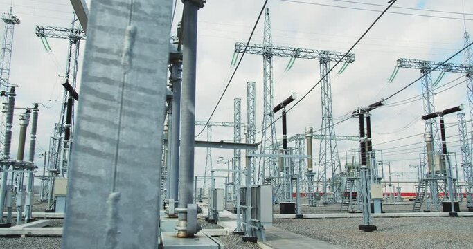 Lots of big metal structures at the power plant, electricity and technology, 4k