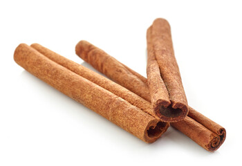 cinnamon sticks on white background