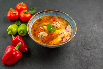 half-top view tasty meatballs soup with vegetables on dark background sauce dish colors