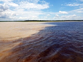 The Meeting of Waters (Portuguese: Encontro das Águas) is the confluence between the Rio Negro, a...