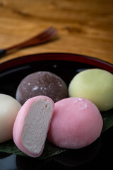 Mochi ice cream on japanese wooden plate