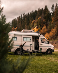 Young couple enjoying holidays in a camper van © Angelina Flores