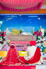 Indian Sikh Punjabi wedding ceremony gurdwara, ritual items, bride, groom, close ups