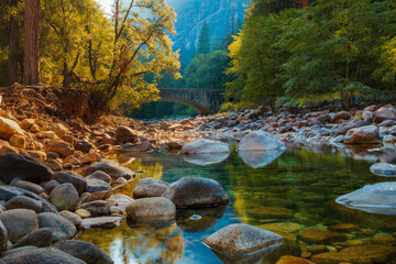 A creek with rocks and trees in Yosemite