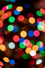 Abstract image of  Christmas lights blurred with bokeh.