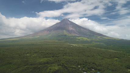 Plakat Closeup Philippines volcano haze eruption aerial. Green grass landmark of Mayon mountain with hiking path. Legazpi countryside mount. Nobody nature landscape at mist. Cinematic drone shot