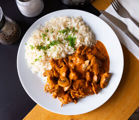 Beef stroganoff with rice. Czech cuisine