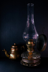 Obraz na płótnie Canvas Vintage Gas lamp old with cooper boiler on black background
