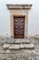 Fototapeta na wymiar Carved Door of Medieval Obidos