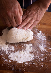 baker kneading dough