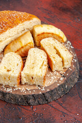 front view delicious sweet pastry sliced in pieces on dark background dough cake pie