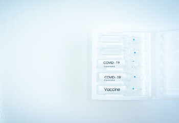 vial of covid19 vaccine on tray