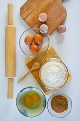 baking ingredients, eggs, flour and brown cane sugar, quarantine home baking concept, domestic life