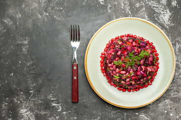top view vinaigrette salad with beans and beet on dark floor salad meal health