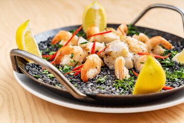 paella with shrimps and lemon