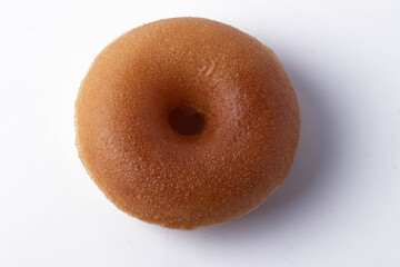 Fototapeta na wymiar Mini donuts on white background