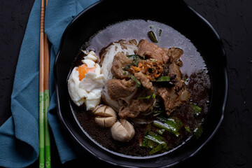 braised pork noodles with black soya stew soup sauce
