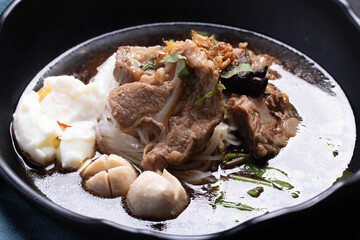 braised pork noodles with black soya stew soup sauce