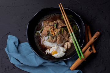 braised pork noodles with black soya stew soup sauce