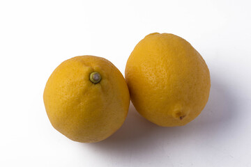 Yellow lemon on a white background