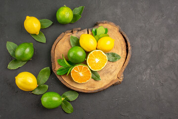 top view fresh sour lemons on dark background tree fruit lime citrus