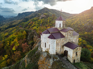 Shoanin christian temple. X century. Karachay-Cherkessia, Dombay, Russia. Mountain, outdoor. Drone shooting