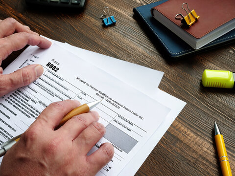 Business concept about Form 8982 Affidavit for Partner Modification Amended Return Under IRC Section 6225(c)(2)(A) with inscription on the piece of paper.