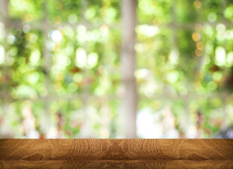 wood table top counter for display product on blur green