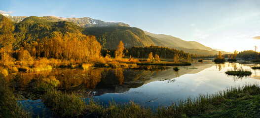 Autumn sunset panorama format photo of Cheam Lake Wetlands Regional Park with the Mount Cheam in the background, Rosedale,