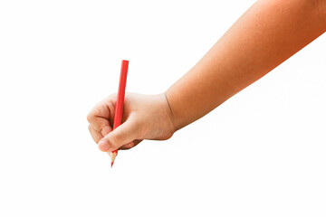 Children hand holding a red pencil on a isolated background.