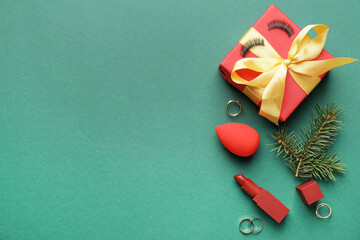 Christmas composition with cosmetics on color background