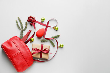Christmas composition with cosmetics on white background