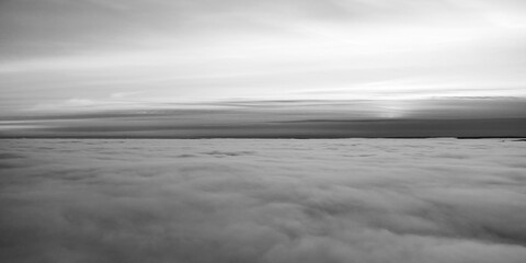 Arial: Photo shot with a drone. Fog in the valley below.  Norway, Oslo, Holmenkollen.