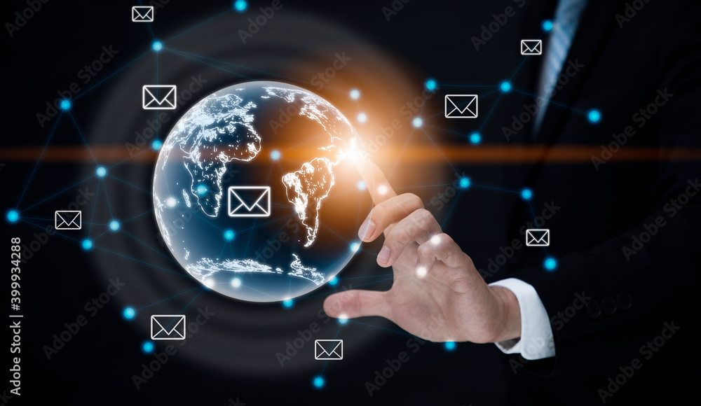 Poster businessman touch the earth connect with email icon on the line of computing network of a media scre