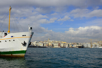 Fototapeta na wymiar Passenger Ferry (Vapur) and fishing boats in Eminönü Station , Kadikoy Istanbul, Turkey