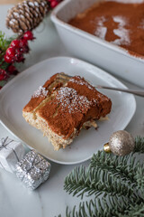 sweet home made christmas tiramisu on a festive table