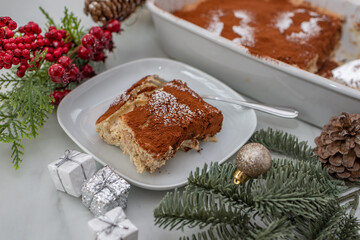 sweet home made christmas tiramisu on a festive table